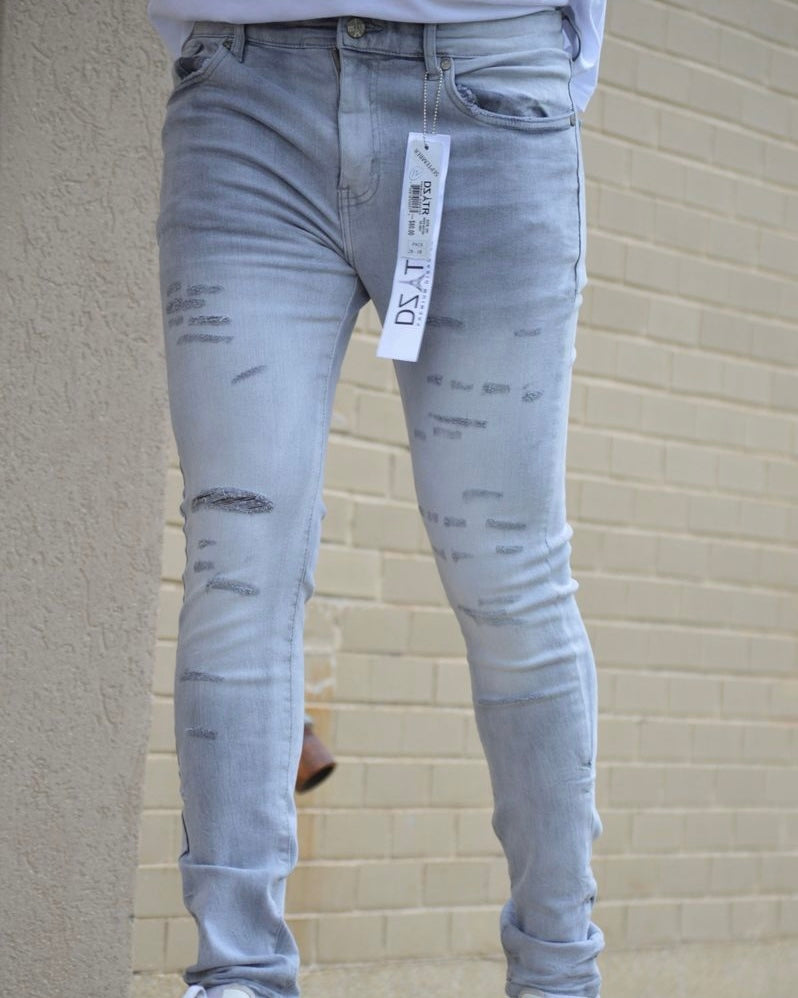 Knee Rip Distressed Slim Jean