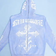 Light blue hoodie with white graphics and text on a light blue background