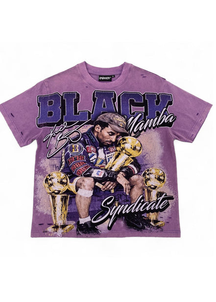 A purple short-sleeve graphic t-shirt featuring a printed illustration of Keanu Mamba holding a trophy, with the text 'BLACK Mamba' and 'Syndicate' on a white background.