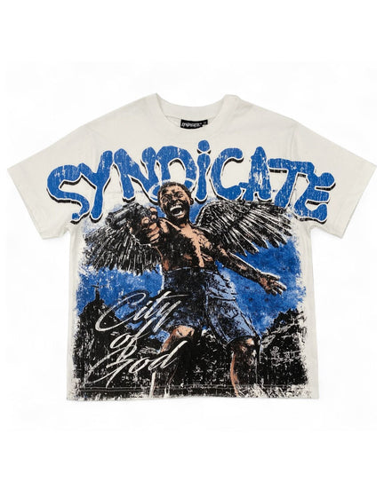 An off-white Syndicate t-shirt featuring a large graphic print of an angel with wings holding a microphone, with 'SYNDICATE' written in bold blue letters across the chest and 'City of God' in white script below.