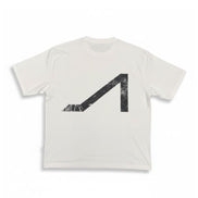 A white short-sleeve crewneck t-shirt featuring a large, distressed black geometric graphic on the front, displayed against a clean white background.