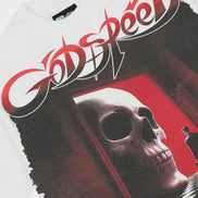 A close-up of a white t-shirt featuring a large graphic print of the band Godspeed. The graphic displays the band's name in stylized red and white lettering above a surreal scene of a large skull in a doorway with a figure standing in the foreground.