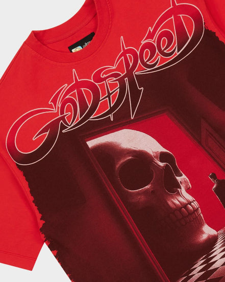 A red short-sleeve graphic T-shirt featuring the band name 'Godspeed' in stylized white and black lettering across the chest, with a large skull and dark hallway scene printed below.