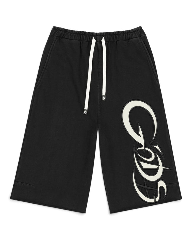 Black drawstring shorts with a large white graphic logo on the lower right leg, displayed flat against a white background.