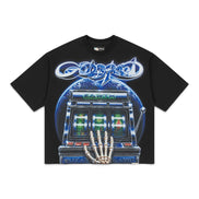 A black short-sleeve t-shirt featuring a large graphic print of the band Godspeed's 'Earth' album artwork, including a blue planet and a skeletal hand touching a slot machine, shown against a plain white background.