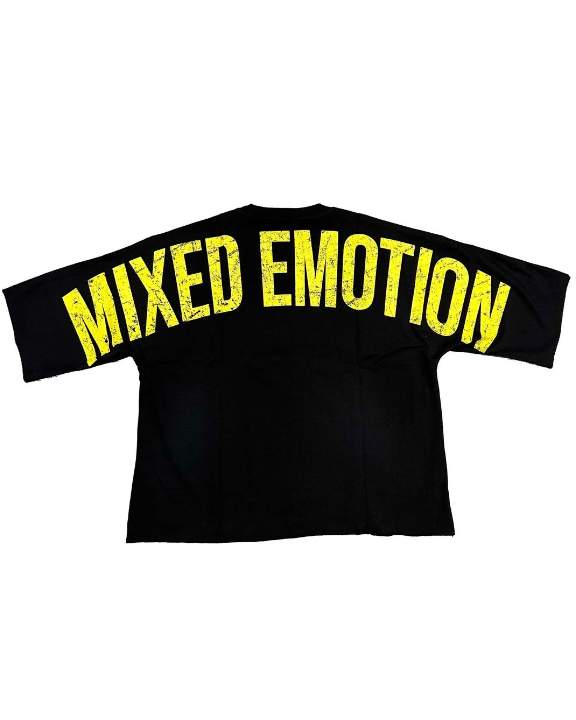 back view of the trapped cropped shirt displaying the brand name Mixed Emotions on the back in yellow. 