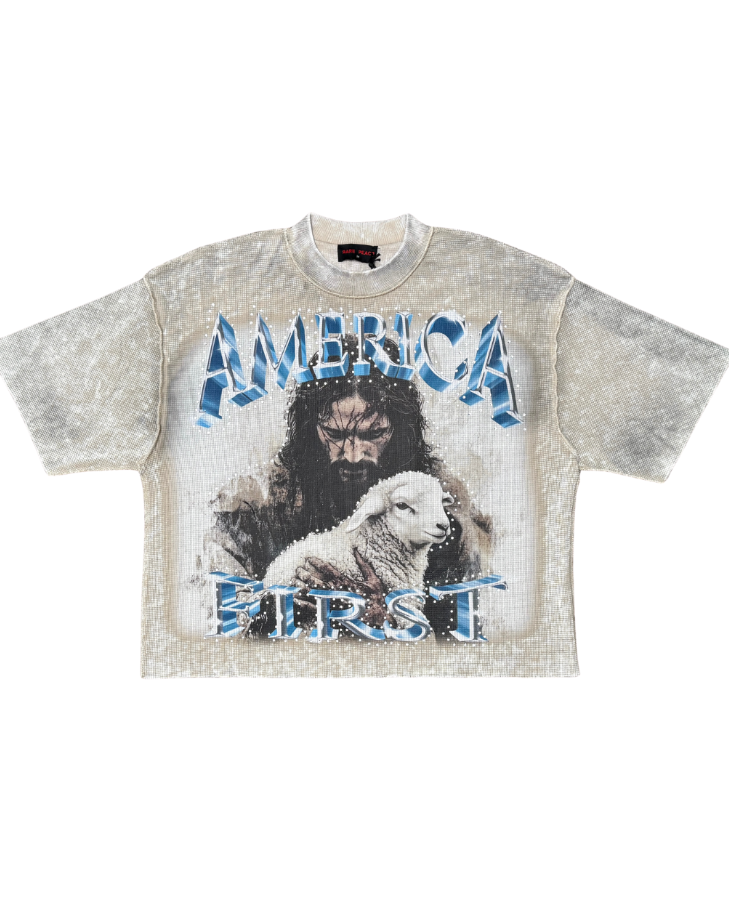 KHAKI t-shirt with graphic design of a man and lamb with 'AMERICA FIRST' text on a white background