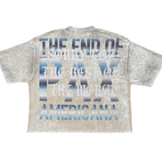 Gray t-shirt with blue and black text on a white background