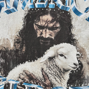 Collage with a figure holding a lamb and text overlay on a textured background