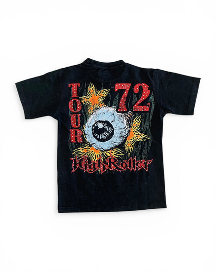 Black t-shirt with a graphic design featuring an eye, flowers, and text on a white background