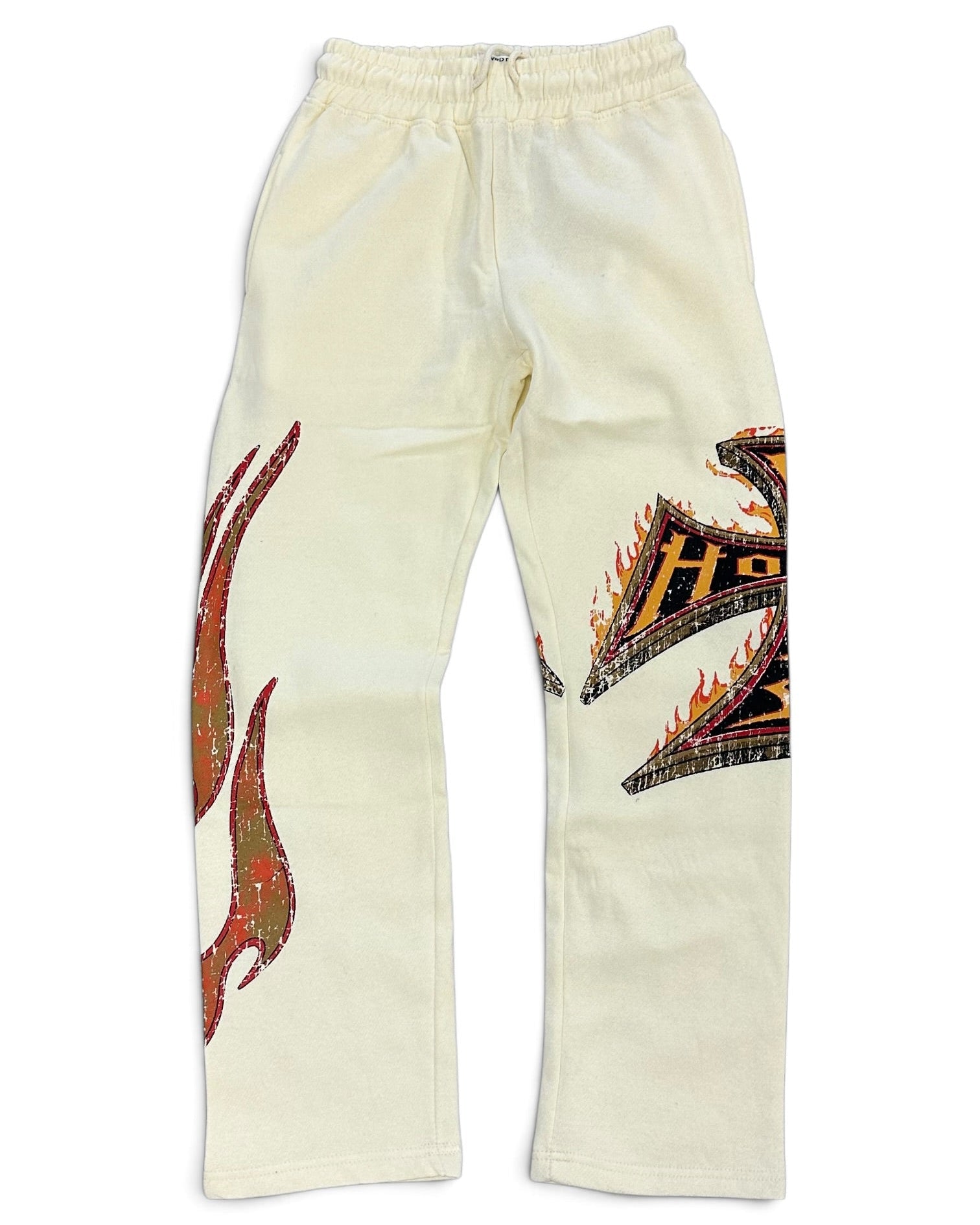 Off-white sweatpants featuring a large red and green flame graphic on the right leg and a black, orange, and yellow tribal-style graphic on the left leg, displayed flat against a white background.