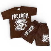 Brown t-shirt and shorts set with 'Freedom' graphic design on a white background