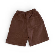 Brown shorts on a white background