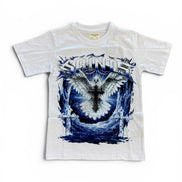 A white short-sleeve t-shirt with a large graphic print on the front featuring a white angel with wings, a black cross, and blue flames, with the word 'SATINOS' in stylized lettering above.