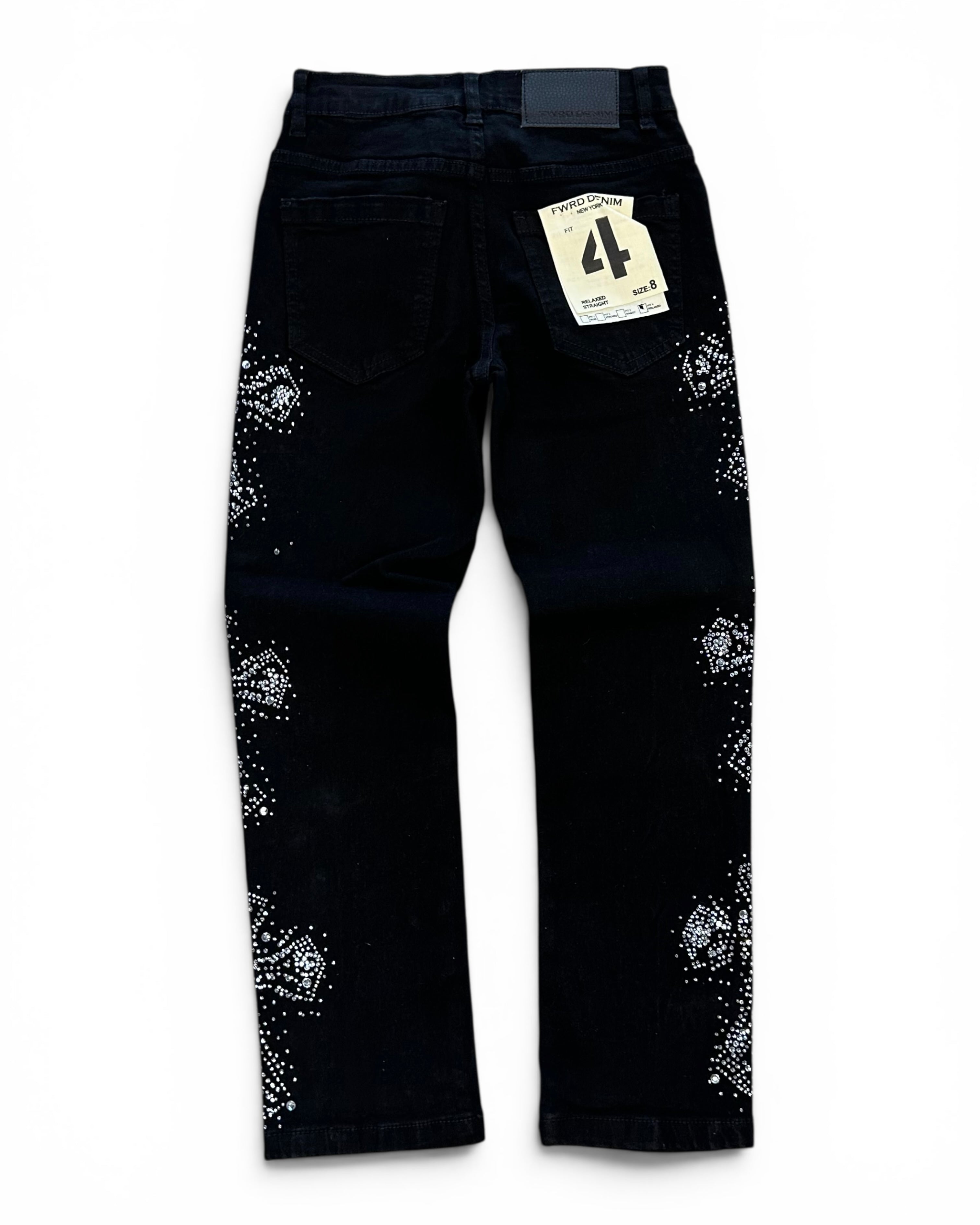 Black denim jeans with white rhinestone embellishments on the outer thighs, shown from the back with a paper tag attached.