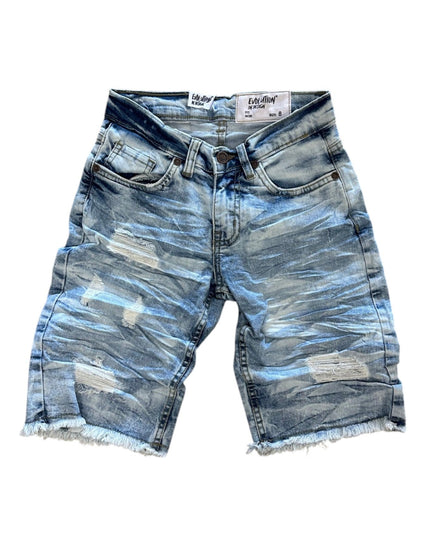 Distressed blue denim shorts on a white background