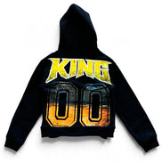 A black cropped hoodie with a large graphic print on the front featuring the word 'KING' in yellow and the number '00' in a gold-to-orange gradient.