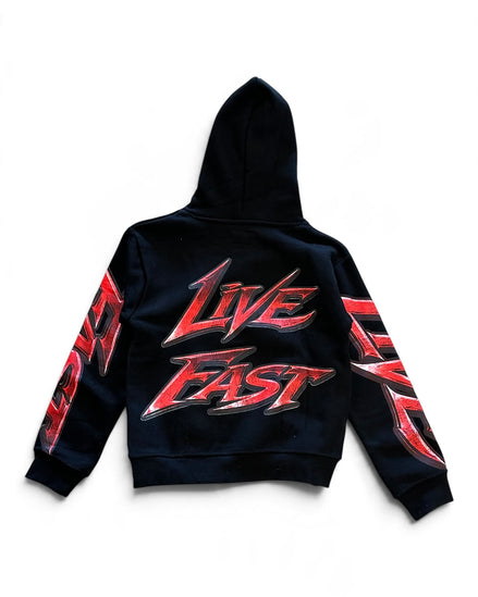 A black hooded sweatshirt shown from the back, featuring a large red and silver 'LIVE FAST' graphic across the center back and matching red and silver graphics on both sleeves, set against a plain white background.