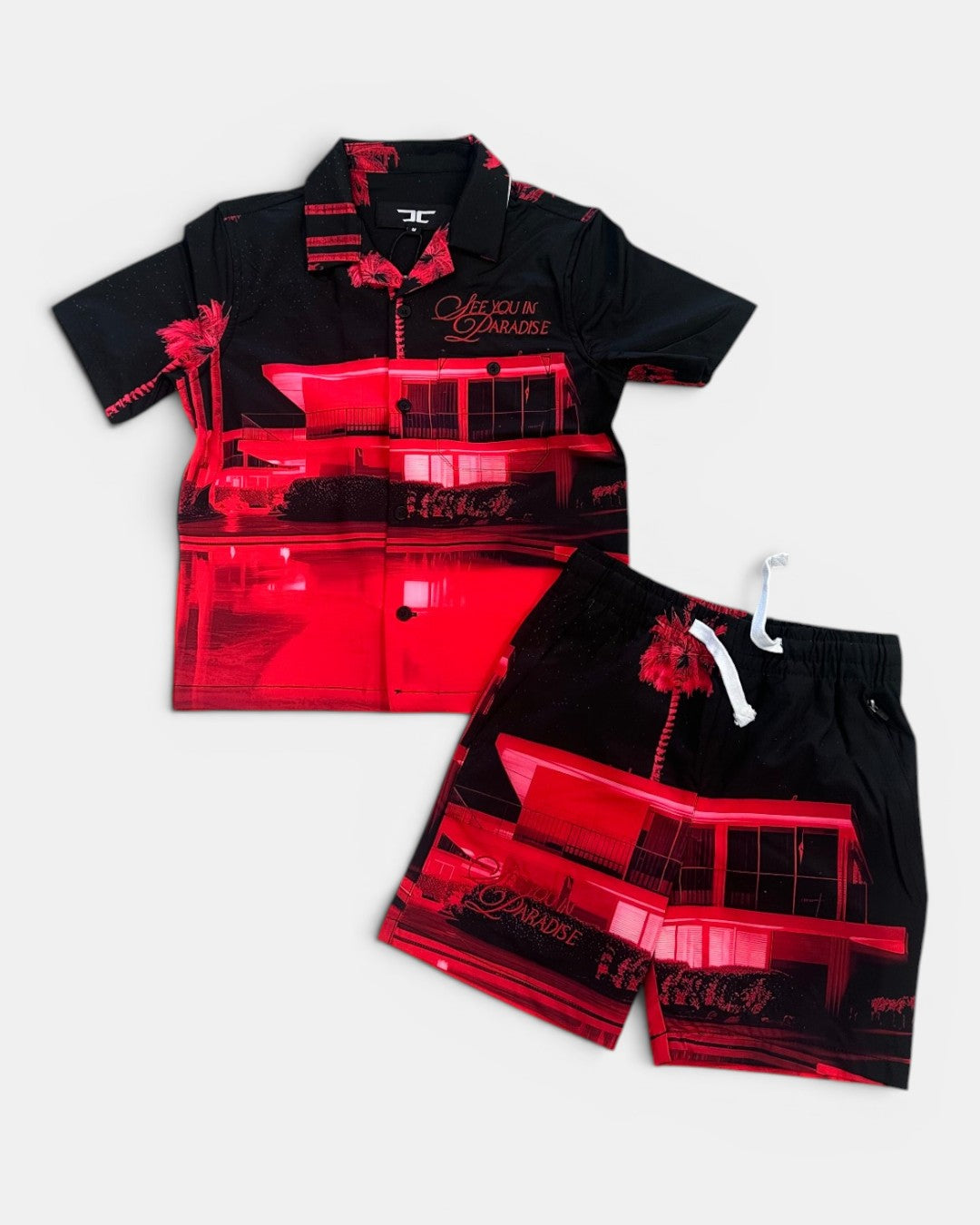Children's black and red outfit with graphic design on a white background