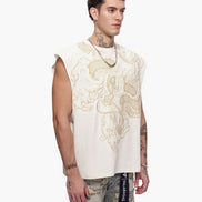 Man wearing a sleeveless embroidered top with a white background