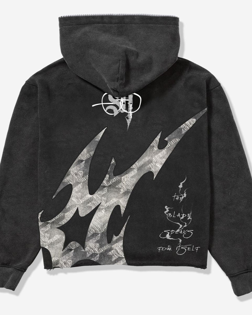 Black hoodie with flame design on the back against a white background