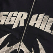 Black hoodie with 'SGR HILL' text and leaf design on a dark background