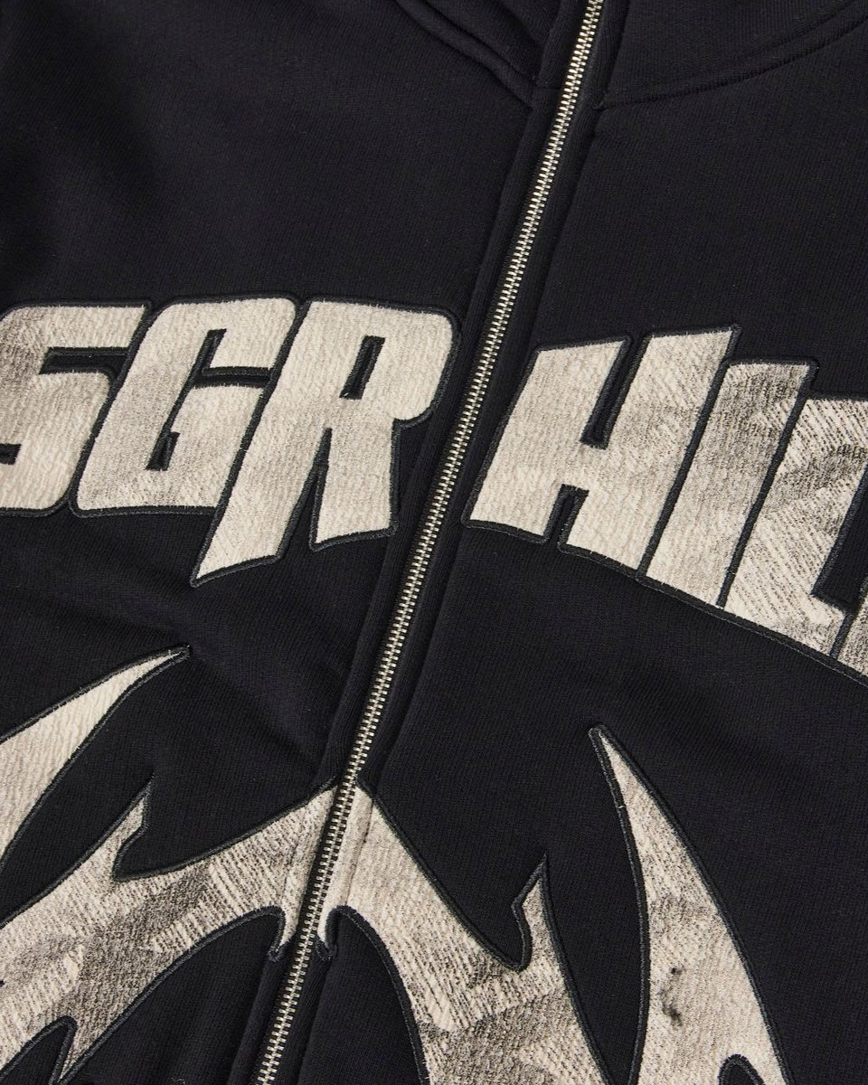 Black hoodie with 'SGR HILL' text and leaf design on a dark background