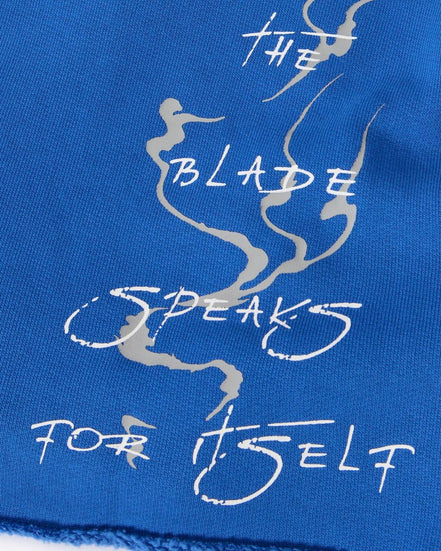Blue fabric with white text and design