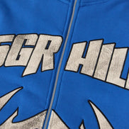 Blue hoodie with 'SGR HILL' text and flame design