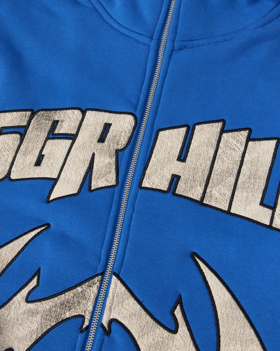 Blue hoodie with 'SGR HILL' text and flame design