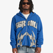 Person wearing a blue hoodie with 'SGR Hill' branding on a white background