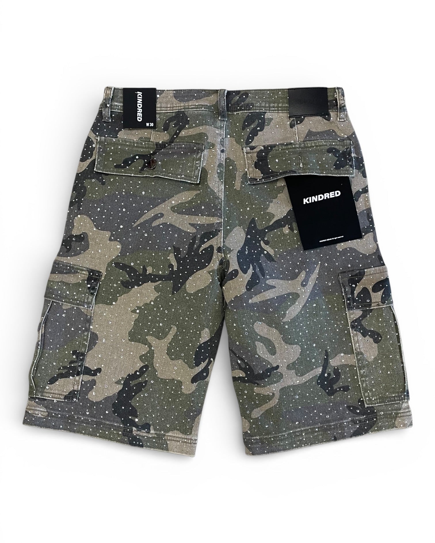 Camouflage shorts with a brand label on a white background