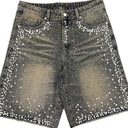 Black denim shorts with white sequins on a white background
