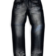 A pair of dark gray to black faded denim jeans with a heavily distressed and whiskered wash, shown flat against a white background.