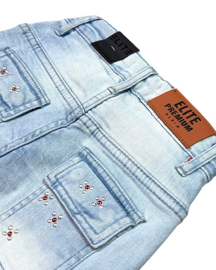 Light blue denim shorts with decorative elements and an 'Elite Premium' label.