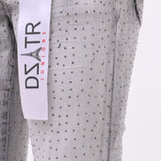 Gray pants with a visible brand label on a white background