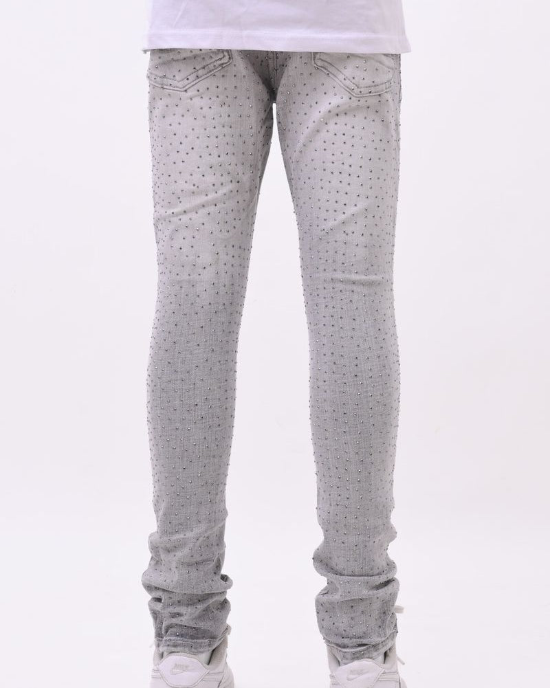 Light gray pants worn by a person on a white background