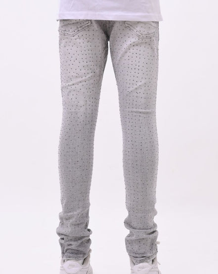 Light gray pants worn by a person on a white background
