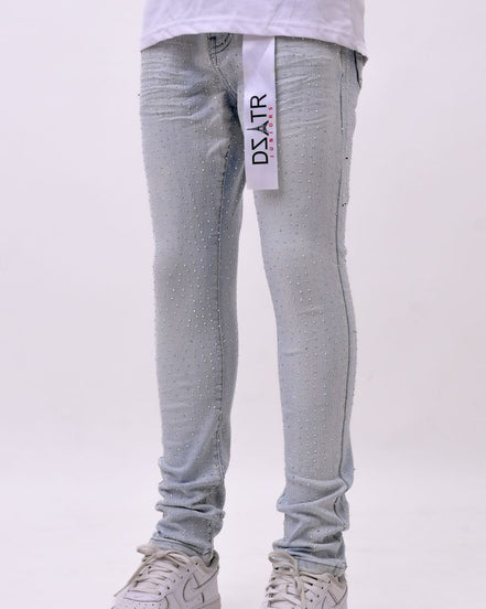 Light blue jeans with a brand tag on a white background