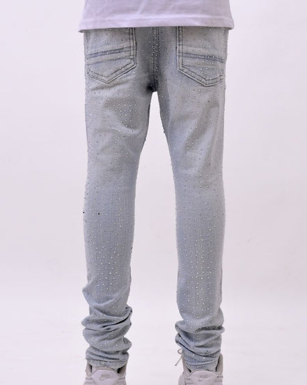 Light blue jeans worn by a person on a white background