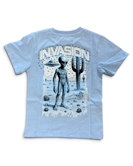 A light blue short-sleeve t-shirt with a large graphic print on the back featuring a silver alien, a cactus, UFOs, and the word 'INVASION' in a distressed stencil font.