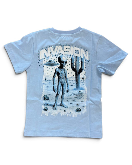 A light blue short-sleeve t-shirt with a large graphic print on the back featuring a silver alien, a cactus, UFOs, and the word 'INVASION' in a distressed stencil font.