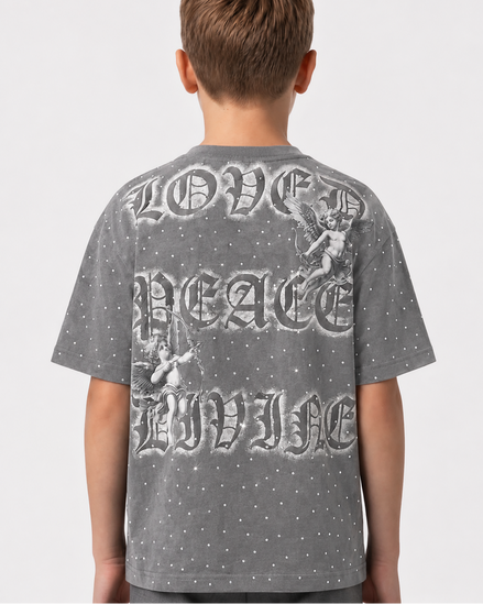 Child wearing a gray t-shirt with 'Love Peace Live' text on the back against a white background