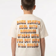Child wearing a t-shirt with a motivational quote on the back against a white background