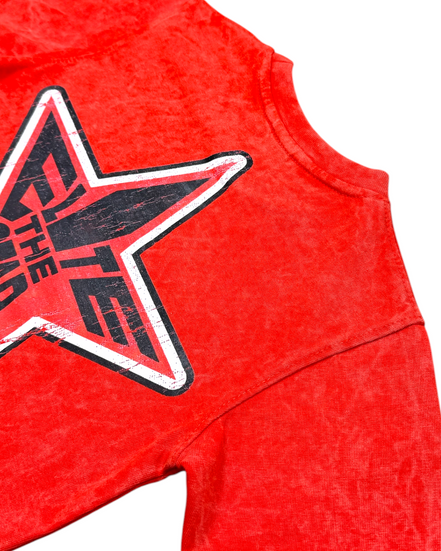 Red tank top with a black star graphic on a white background