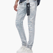 Light blue jeans with a brand label on a white background