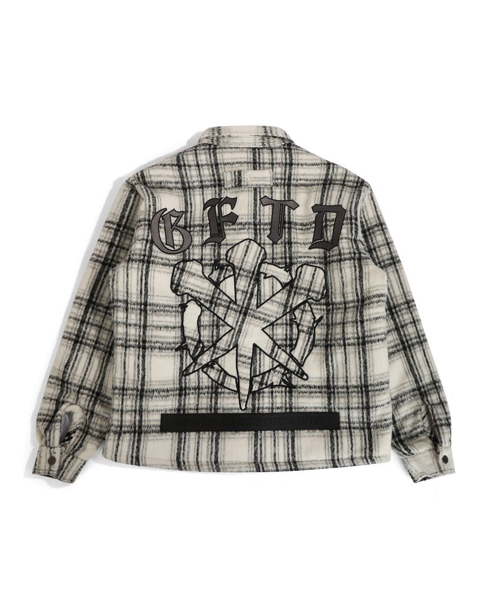 Plaid jacket with graphic design on the back against a white background
