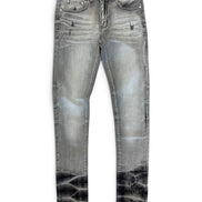 A pair of slim-fit denim jeans in a faded gray wash with a black acid-wash distressed finish at the hems, shown flat on a white background.
