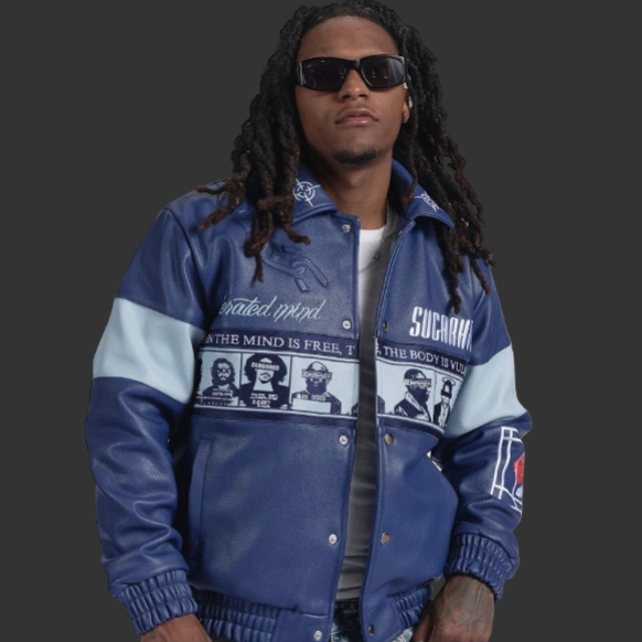 Man wearing a blue jacket with graphic designs on a white background