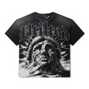 A black short-sleeve graphic t-shirt featuring a large black and white print of the Statue of Liberty's face and the word 'Vtilted' in a gothic font across the chest, shown against a plain white background.
